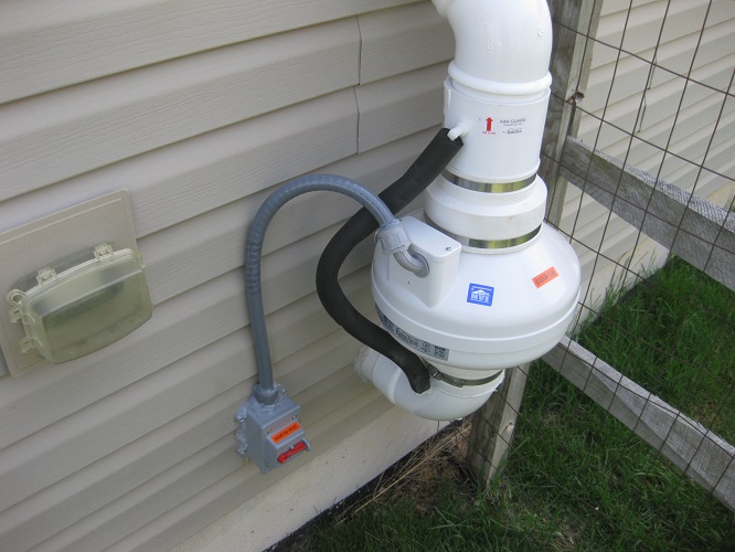 Radon mitigation system fan